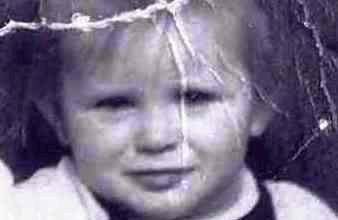 tattered old photo of a toddler girl, Alexina Kelbie.