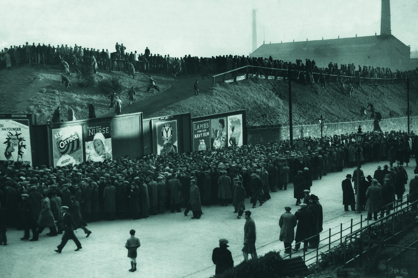 Fans gather for Dundee vs Rangers in 1949.