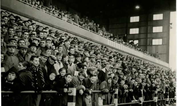 Some of the crowd at East End Park during a match against Rangers in November 1963.