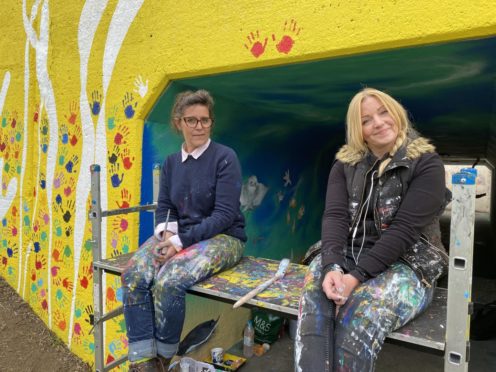 Artists Celie Byrne and Donna Forrester at Dalgety Bay underpass.