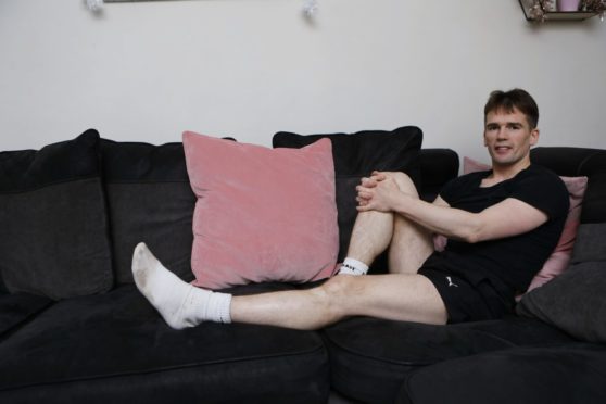 Kenny relaxing at home after his gruelling challenge.