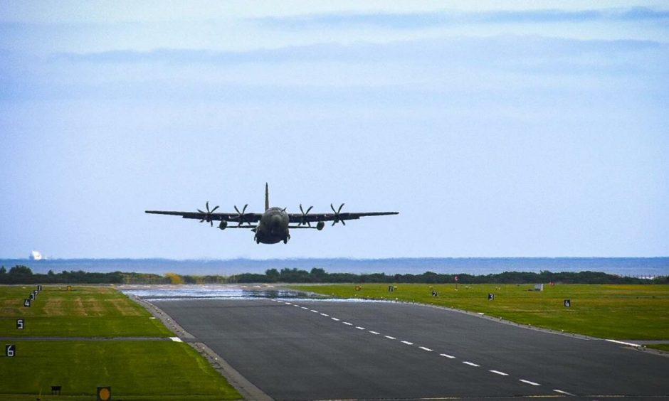 A Hercules aircraft leaves Leuchars Station on Tuesday afternoon.