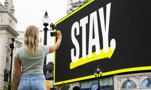 The word 'STAY' features on the Piccadilly Circus Lights as part of a new campaign to mark World Suicide Prevention Day. Campaign Against Living Miserably (CALM), London.  David Parry/PA Wire