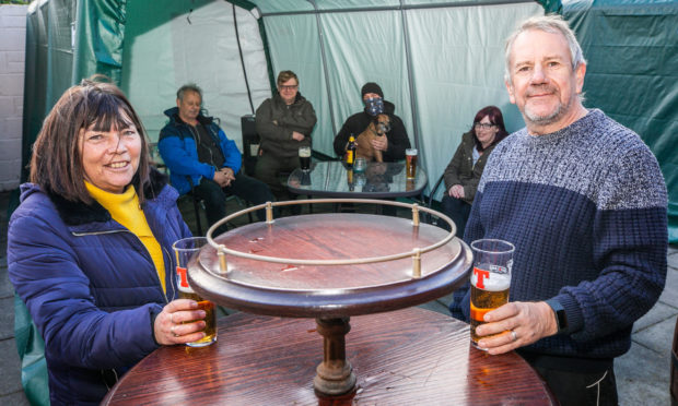 Stag Head Inn licencees Jackie Liddell and husband Kevin in the beer garden in Carnoustie. Photo by Steve Brown/DCT Media.