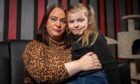 Leanne Campbell and daughter and Ava Craig, 7, at home, following the terrifying attack in Dundee city centre on Friday. Picture by Kim Cessford / DCT Media