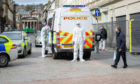 Police in hazmat suits were called to Reform Street. (Picture: DCT Media/Kim Cessford_