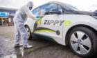 Sterilisation expert Stephen Roberts giving a Zippy D car a deep clean.