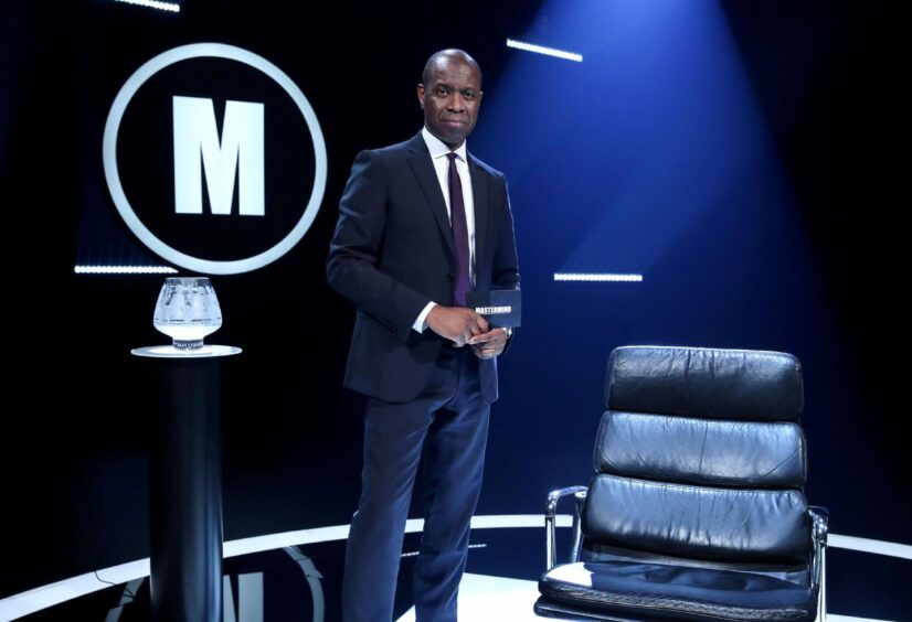 Clive Myrie on the Mastermind set.