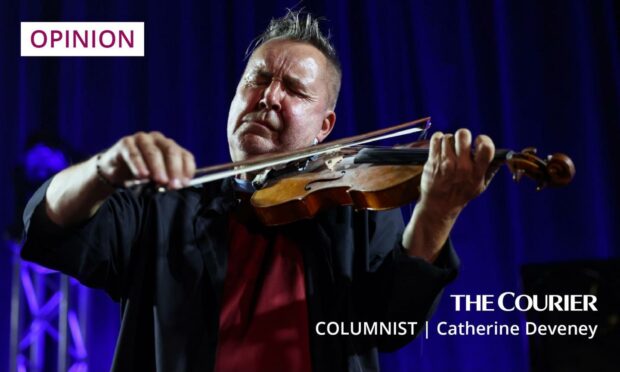 Mandatory Credit: Photo by Rafal Guz/EPA/Shutterstock (8792014c)
Nigel Kennedy
Nigel Kennedy in concert in Warsaw, Poland - 06 May 2017
British violinist Nigel Kennedy (L) performs on stage with the Cappella Gedanensis band during their concert in Warsaw, Poland, 06 May 2017.