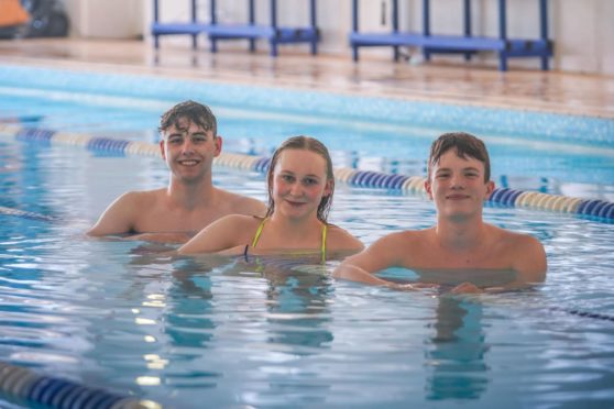 Strathallan School pupils Owen Carroll, Elise Cosens and Evan Davidson have been chosen to represent Scotland's national swimming team.