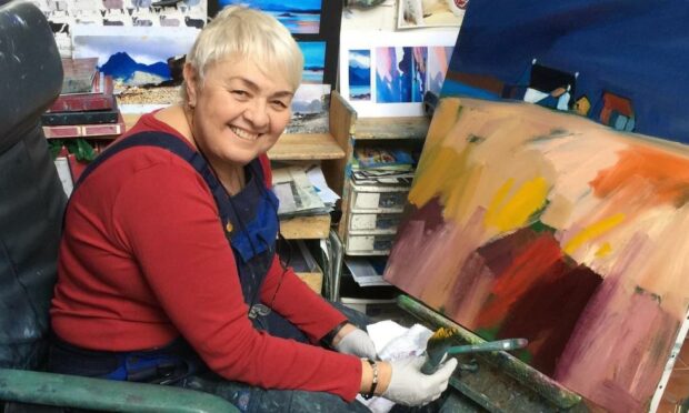 Pam Carter at work in her home studio.