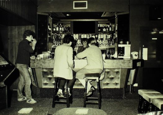 Locals around the bar at Benson's on Arbroath Road