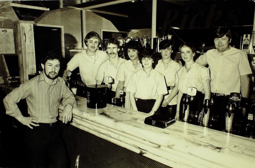 Bar staff pose for a photo at the opening of Ricks disco (now Reading Rooms) on Blackscroft in 1983.
Pictured are (left to right) manager Ian Thomas, Gary Thomson, David Leith, Angela Stewart, Petrina Bayne, Aileen Scanlan, Caril Field and Eddie Bignell.