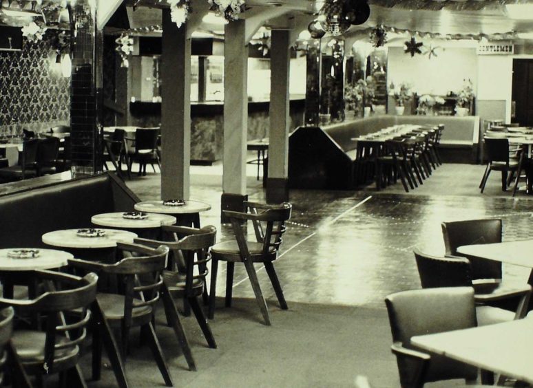 The dancefloor, tables and bar area of the Hubara nightclub on Broughty Ferry Road. (1981)