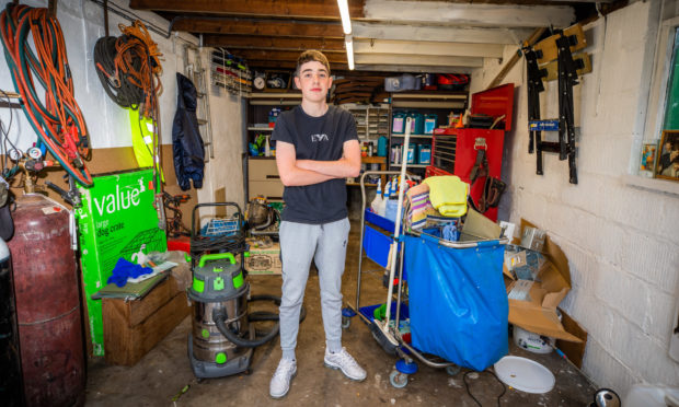 Chris McDonell, 15, has set up own valet servcie from his home in Dundee - AR Valets. Picture by Steve MacDougall / DCT Media.