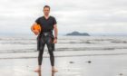 Kinghorn RNLI crew member, Donnie MacLean, has become to he first to swim to Inchkeith Island and back.