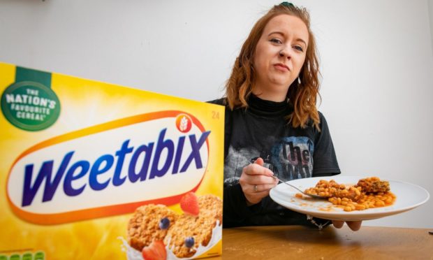 Reporter Amy Hall trying out the Weetabix challenge