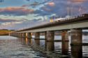 Courier Features - Vague information - Oor Wullie at Tay Bridge  possible magazine cover for issue about Tay Road Bridge anniversary. Picture shows; Tay Road Bridge and River Tay at dusk, Tuesday 09 August 2016.