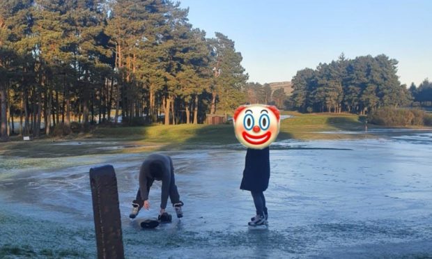 People skating on the ice at Forfar golf club.