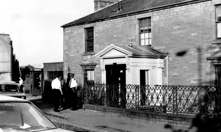 Police outside the murder scene at Roseangle, Dundee, in 1980.
