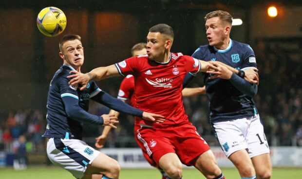 Jordan Marshall and Lee Ashcroft get to grips with Christian Ramirez.