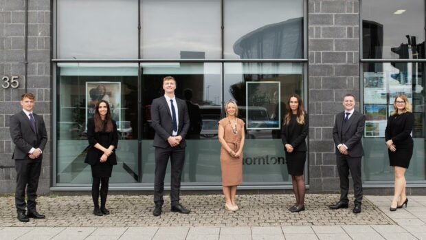 The new trainees - Walter Buckman, Antonia Kildaire, Finlay Williamson, Martyna Kotlarz, David Durie and Hannah Smethurst with Thorntons managing partner Lesley Larg