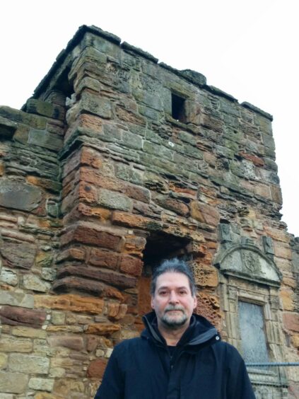 Richard Falconer outside the Haunted Tower at St Andrews Cathedral