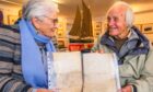 Fay Will handing over the charter to Ian Reekie (St Monans Heritage Museum)