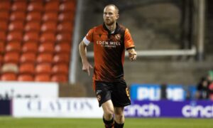 Mark Reynolds in action for Dundee United during a Premier Sports Cup Quarter Final against Hibs