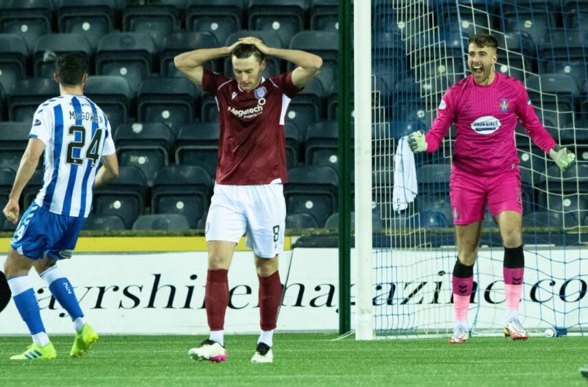 Michael McKenna reacts after missing a penalty in the 80th minute.