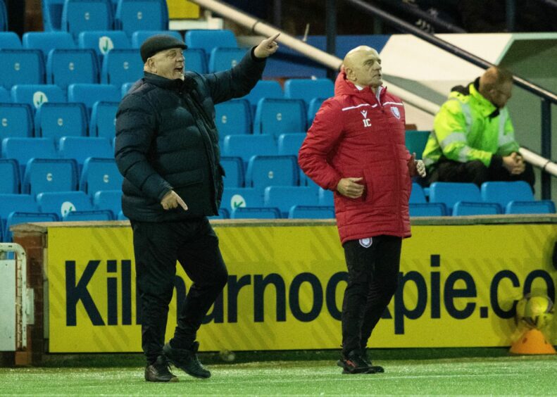 Arbroath manager Dick Campbell instructs his players, alongside his assistant and brother Ian.