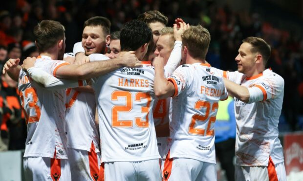 Dundee United players celebrate Louis Appere's goal at Ross County
