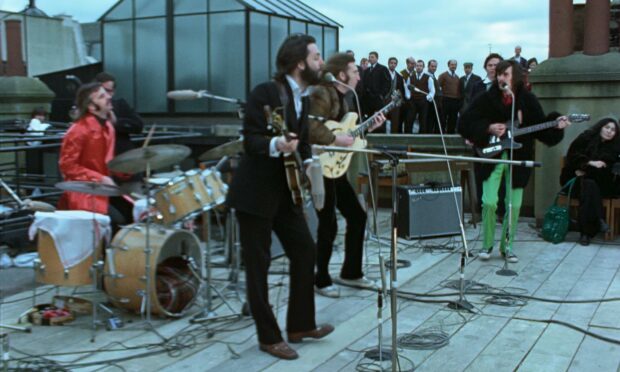Ringo Starr, Paul McCartney, John Lennon, and George Harrison in The Beatles: Get Back.