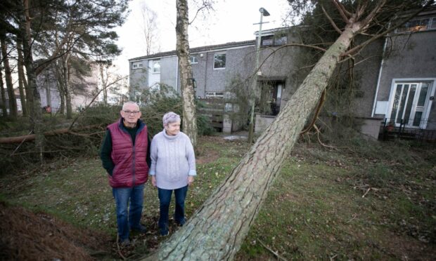 Stella and Richard Hutchison outside their house on Garvock Place, Dundee. Picture credit Kim Cessford / DCT Media.