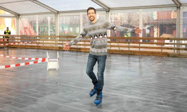 Dundee City Council leader John Alexander on the ice ahead of the opening of Winterfest