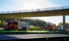 The scene of a lorry crash at a flyover on the M90