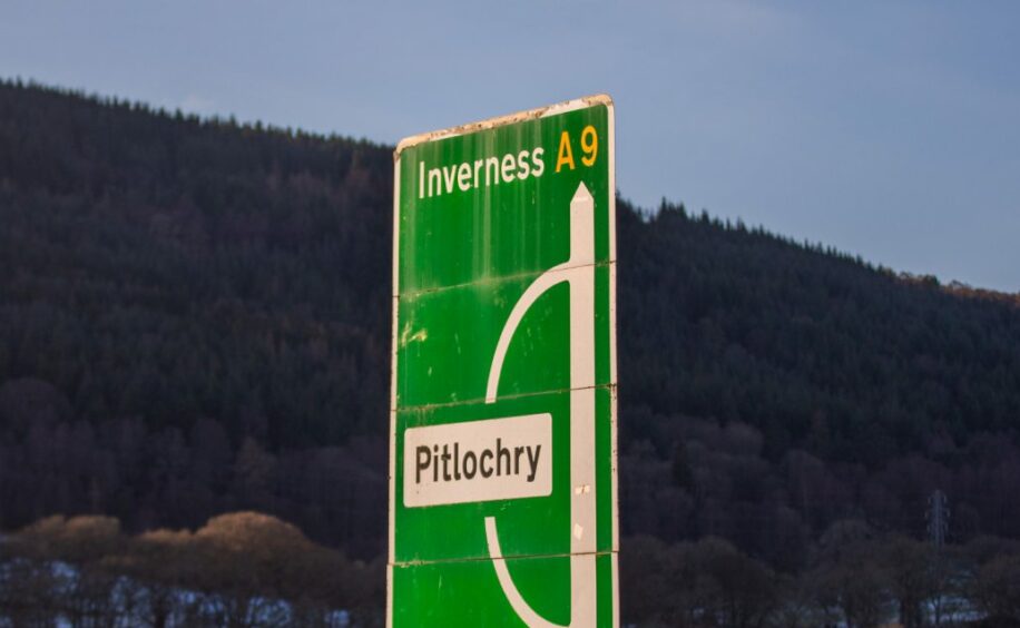 A green road sign on the A9 showing the turn-off for Pitlochry