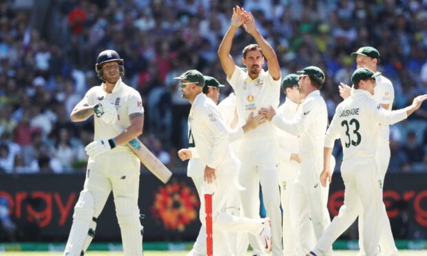 Australia's Mitchell Starc celebrates the wicket of England's Ben Stokes.