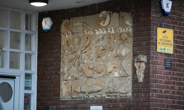The 30-year-old mural will be replaced with plastic signage.