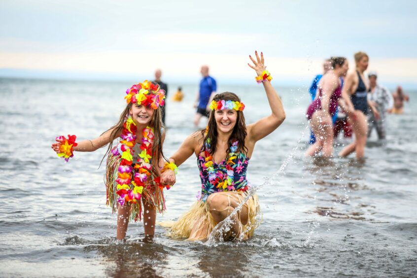 Charlotte Watson with mum Dawn, both from Kinghorn, during a New Year's Day dook in January 2020.