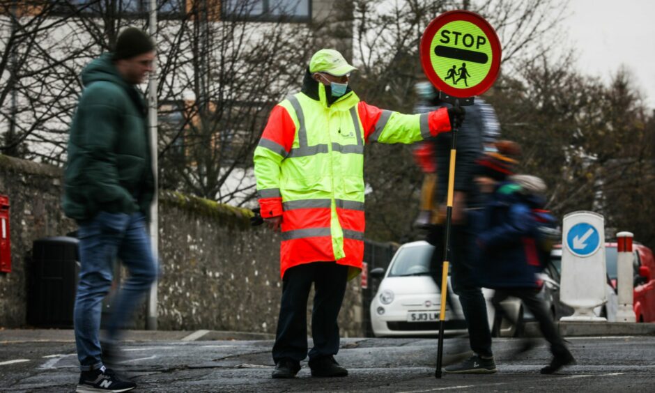 A school crossing patroller point at a Eastern Primary has been granted a reprieve after parents launch petition against controversial plans to remove it.