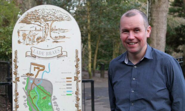 Councillor Brian Thomson at the entrance to the Lade Braes, St Andrews.
