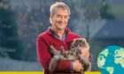 Jo Hugh-Jones with his cat before talking heating & sustainable living