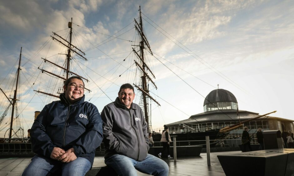 Dundee Eats owners Jamie McPhee (left) and Lauchlan Cox (right) beside the Discovery boat, which inspired their logo.