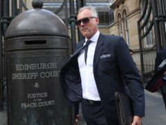 Former TV presenter John Leslie leaves Edinburgh Sheriff Court (Andrew Milligan/PA)
