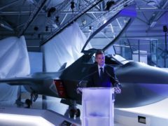 Defence Secretary Gavin Williamson unveils the new Tempest fighter jet (Andrew Matthews/PA)