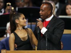 Bishop Charles H Ellis III has apologised for how he touched Ariana Grande on stage (AP Photo/Paul Sancya)