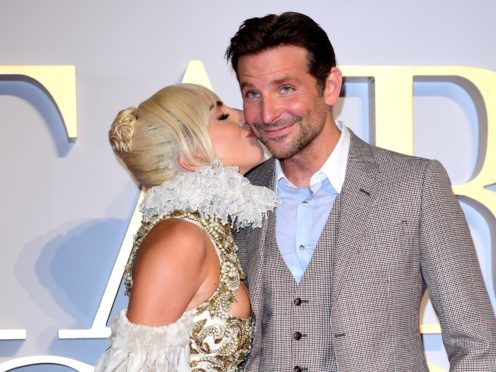 Lady Gaga and Bradley Cooper are at number one in the album and singles charts (Ian West/PA)