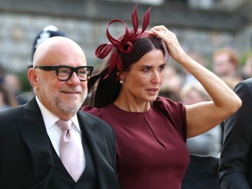Demi Moore (right) arrives ahead of the wedding of Princess Eugenie to Jack Brooksbank at St George’s Chapel in Windsor Castle.