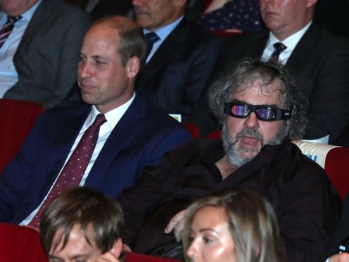 The Duke of Cambridge and Peter Jackson take their seats for the world premiere of They Shall Not Grow Old (Daniel Leal-Olivas/PA)